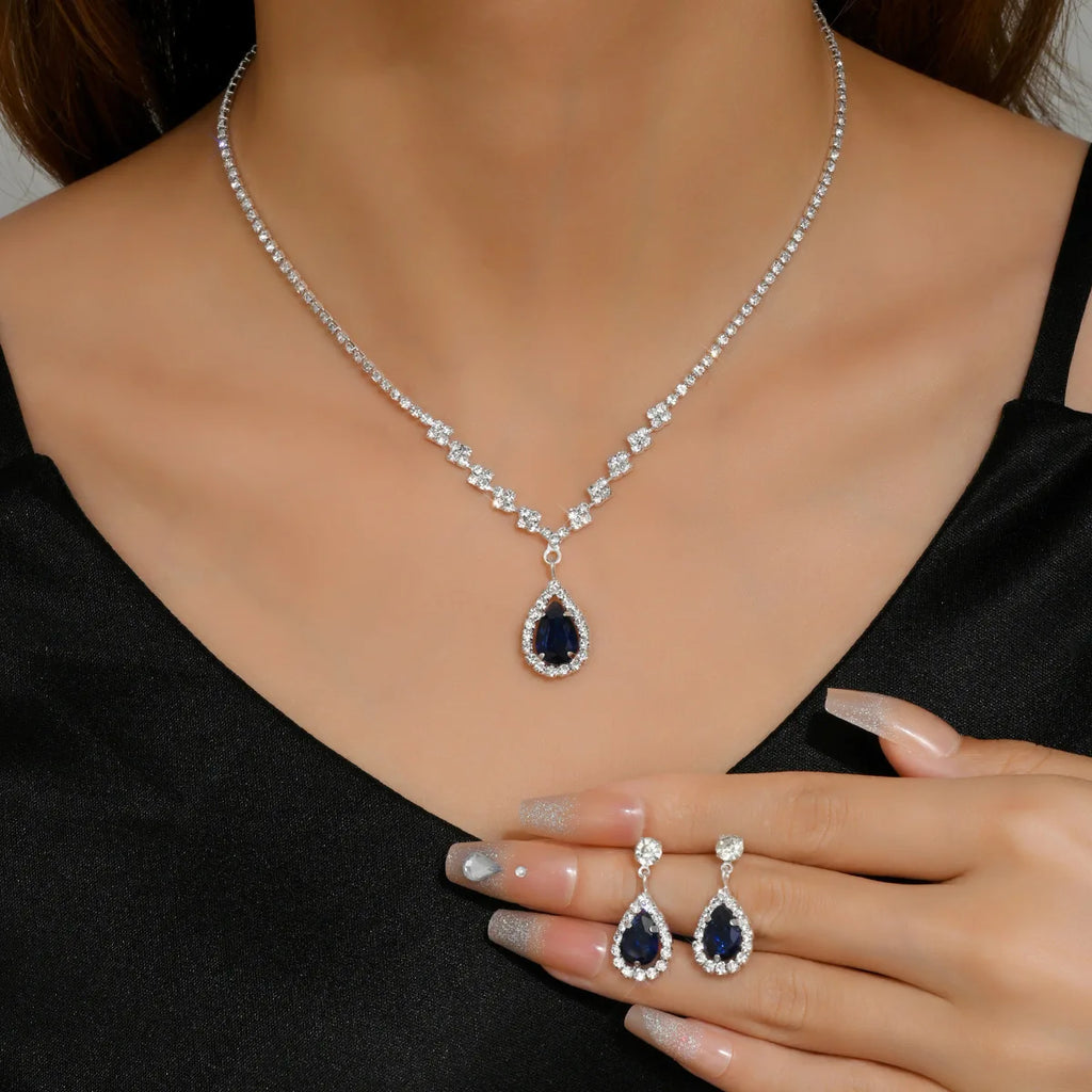 Parures de bijoux élégantes pour femme, style « goutte d’eau », avec cristaux roses (collier et boucles d’oreilles) – Idéal pour un mariage ou une cérémonie.