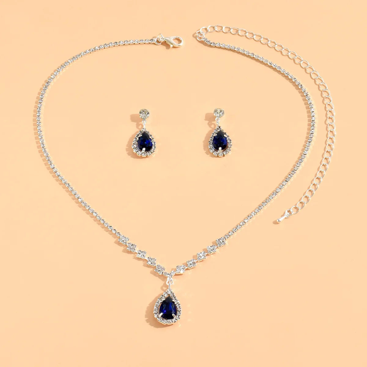Parures de bijoux élégantes pour femme, style « goutte d’eau », avec cristaux roses (collier et boucles d’oreilles) – Idéal pour un mariage ou une cérémonie.